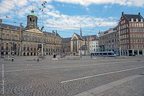 Canvas Print City scenic from Amsterdam at the Dam Square with the Royal Palace in the Nether