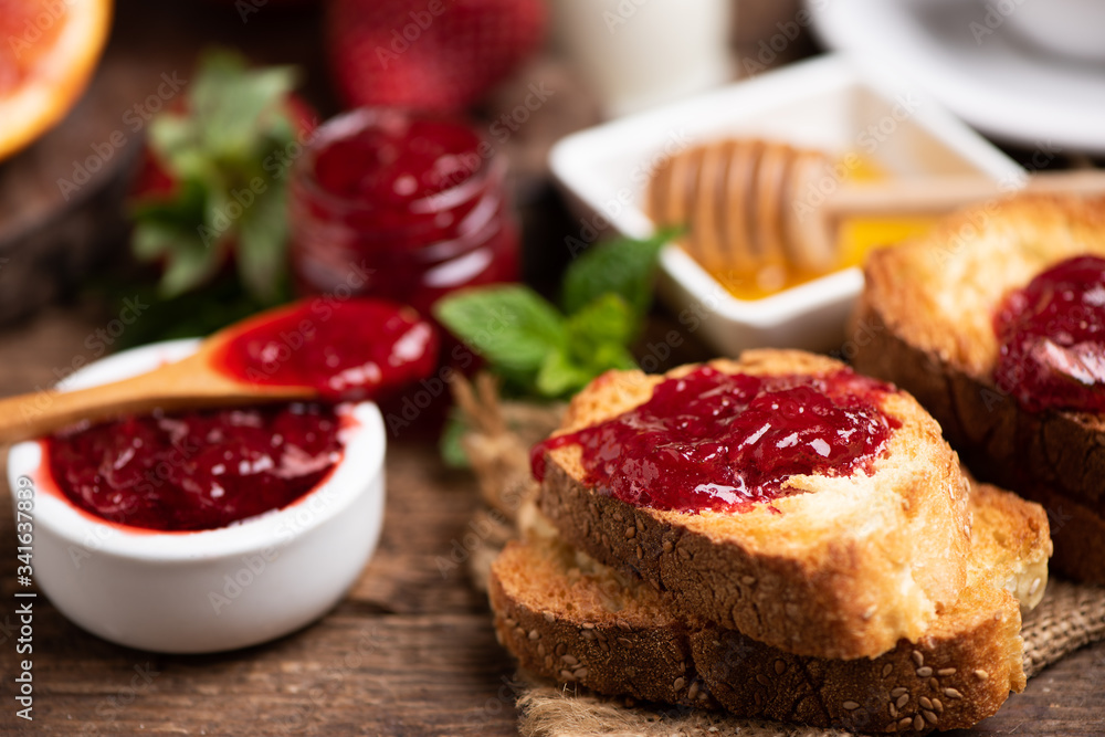 Fresh strawberry jam with bread for breakfast Fresh strawberry jam with bread for breakfast
