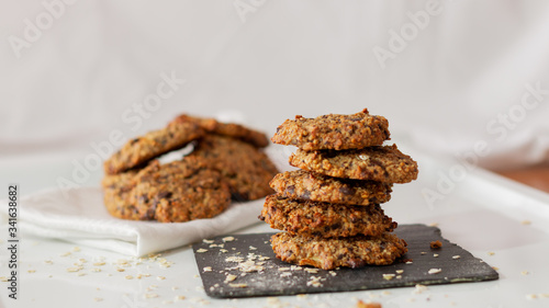 OAT AND BANANA COOKIES ON A WHITE BACKGROUND