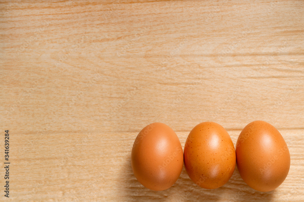 eggs on wooden table eggs on wooden table