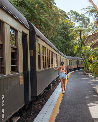 Tableau sur toile Woman & Kuranda Scenic Railway Train