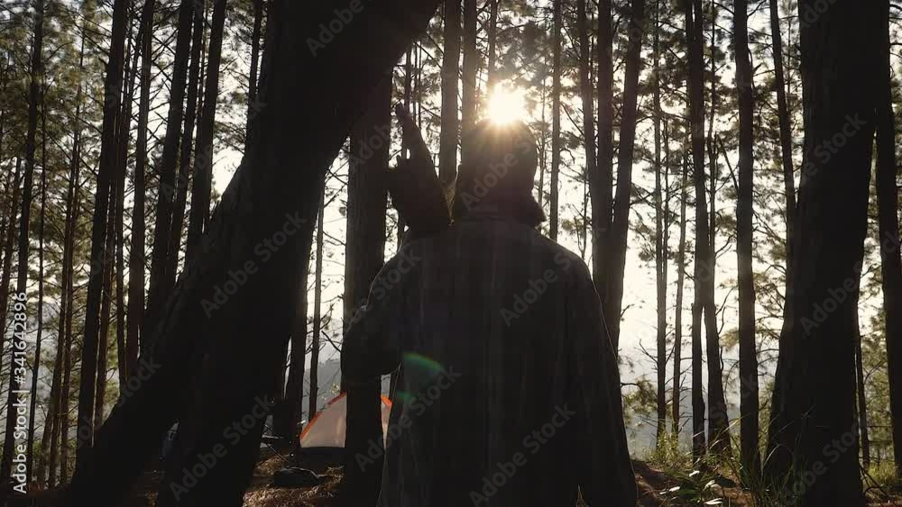 Lumberjack chopping wood in the camp Lumberjack chopping wood in the camp