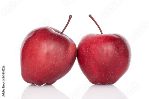 Group of two whole red delicious apple isolated on white
