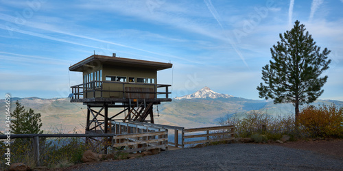 Green Ridge Lookout in Central Oregon with Mt Jefferson at background after sunrise.