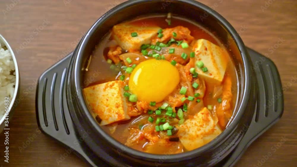 ‘Kimchi Jjigae’ or Kimchi Soup with Soft Tofu or Korean Kimchi Stew - Korean Food Traditional Style ‘Kimchi Jjigae’ or Kimchi Soup with Soft Tofu or Korean Kimchi Stew - Korean Food Traditional Style