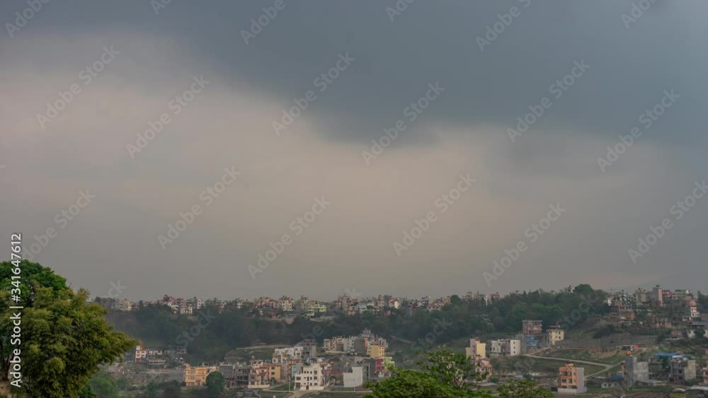 A huge storm cloud of a coming thunderstorm over the city of Kathmandu. A huge storm cloud of a coming thunderstorm over the city of Kathmandu.