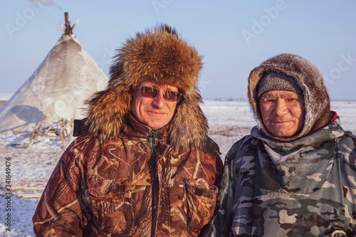 Tundra, Yamal Peninsula, far north, reindeer pasture, dwelling of northern peoples, assistant reindeer breeder, the men in national clothes,