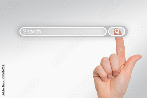 Finger is pressing a search button