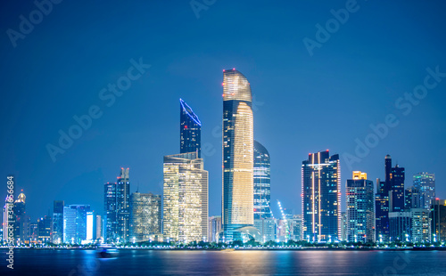 night view of Beautiful City of Abu Dhabi taken during blue hour view from marina backwater UAE  photo