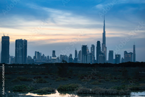 Photography a rare view of dubai downtown from Ras Al Khor, evening