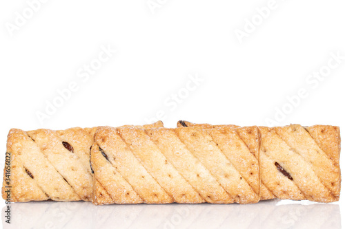 Lot of whole square puff cookie with raisins isolated on white