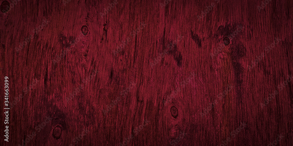 Obraz premium Dark burgundy wood texture. Texture of old dried plywood. Mahogany background for design.