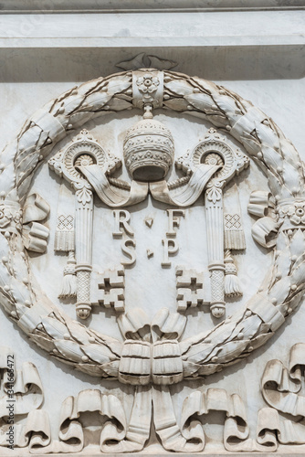 Vatican, Rome / Italy 10.02.2015.Vatican Coat of Arms on the Facade of the Papal Basilica of Saint Peter in the Vatican