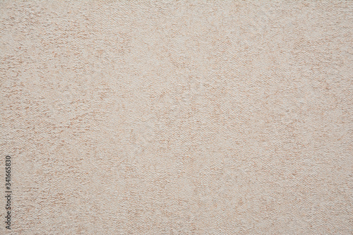 Sand structure for screensavers on the background. Beige splash texture.