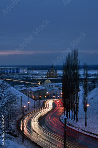 Nizhny Novgorod city at night. blurry car headlights. views of the Church and the stadium © Igor