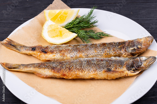 Mackerel grilled, served with lemon and dill