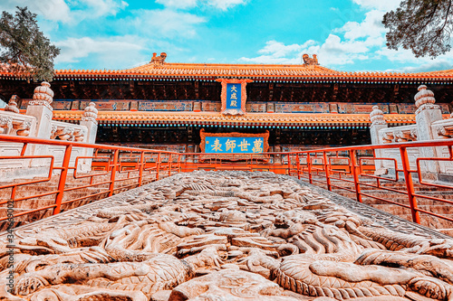 Stone stairs with dragons in Temple of Confucius.Inscription, translated from Chinese means:Dacheng Hall (Hall of Great Accomplishment and Chongshengci).China. photo