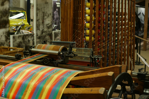 Cloth making machine using threads to create clothes