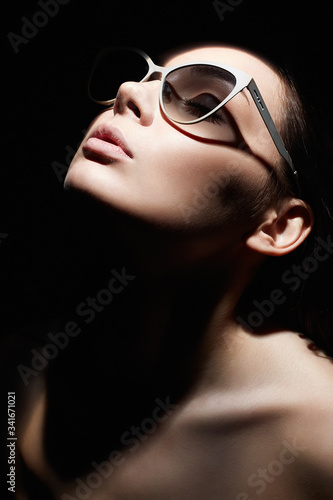 portrait of Beautiful woman in glasses. Retro style portrait