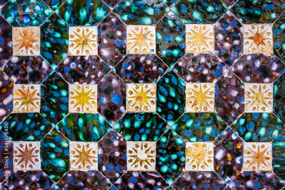 Fototapeta premium Traditional tiled wall decoration in a city palace in Seville, Spain
