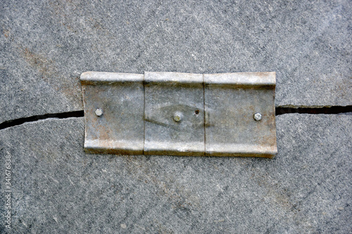Slika na platnu Repair fence made of gray sheets