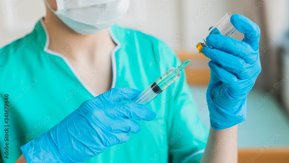 Close-up ampoule and syringe with medical mask Close-up ampoule and syringe with medical mask