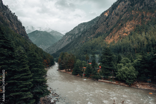 Parvati River Valley surrounded by mountains and deodar forests photo