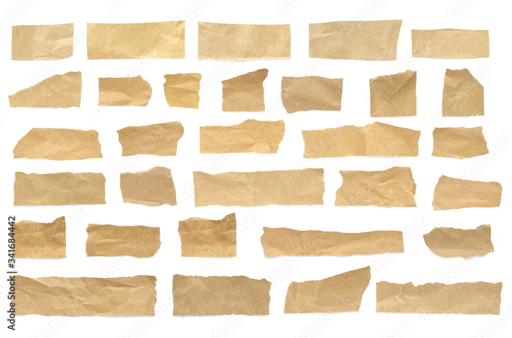 Recycled paper craft stick on a white background. Brown paper torn or ripped pieces of paper isolated on white background.	
