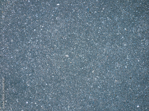 Close up of a grey concrete floor tile © Anna