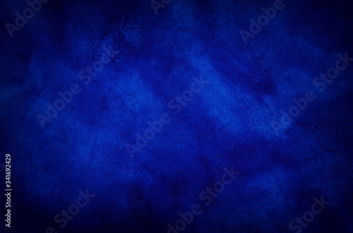 Dark blue marble or cracked concrete background (as an abstract mystical background or marble or concrete texture)