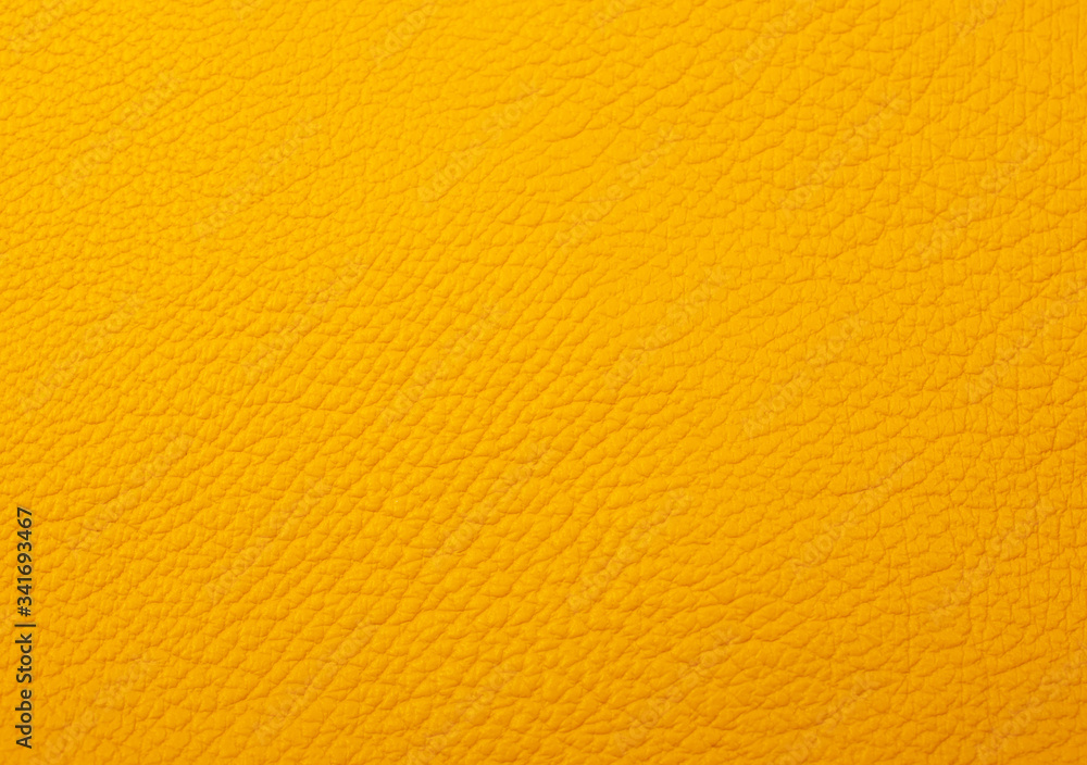 Bright yellow leather as a leather texture or an abstract yellow background Bright yellow leather as a leather texture or an abstract yellow background