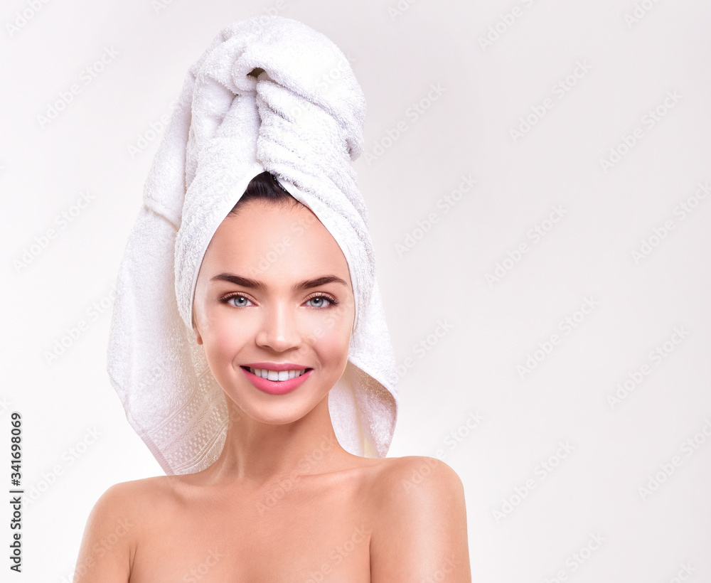 Beautiful young woman perfect skin. Healthy woman in towel with perfect skin Beautiful young woman perfect skin. Healthy woman in towel with perfect skin