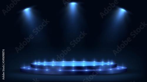 Round blue luminous stage with steps and spotlights, futuristic pedestal