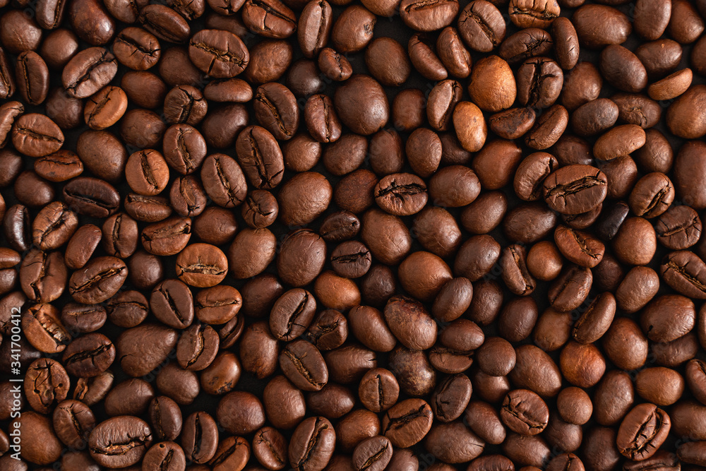 Roasted coffee beans background, top view Roasted coffee beans background, top view