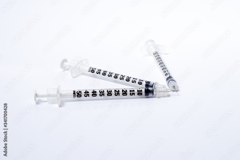 syringe over white background syringe over white background