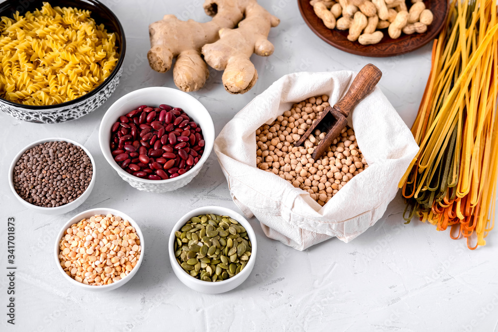 Pasta, lentils, Ginger Root, Chickpeas And Beans In Bowls. Pasta, lentils, Ginger Root, Chickpeas And Beans In Bowls.
