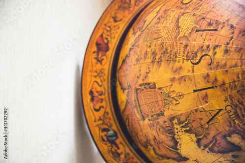 wooden globe on wooden surface