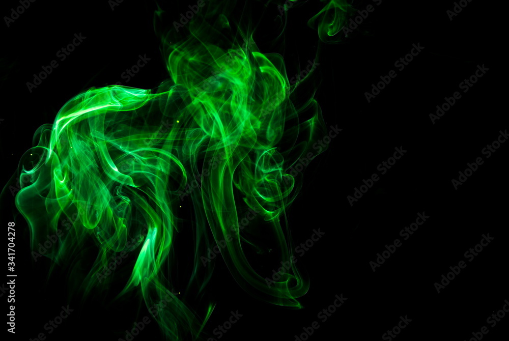 Green smoke on black background