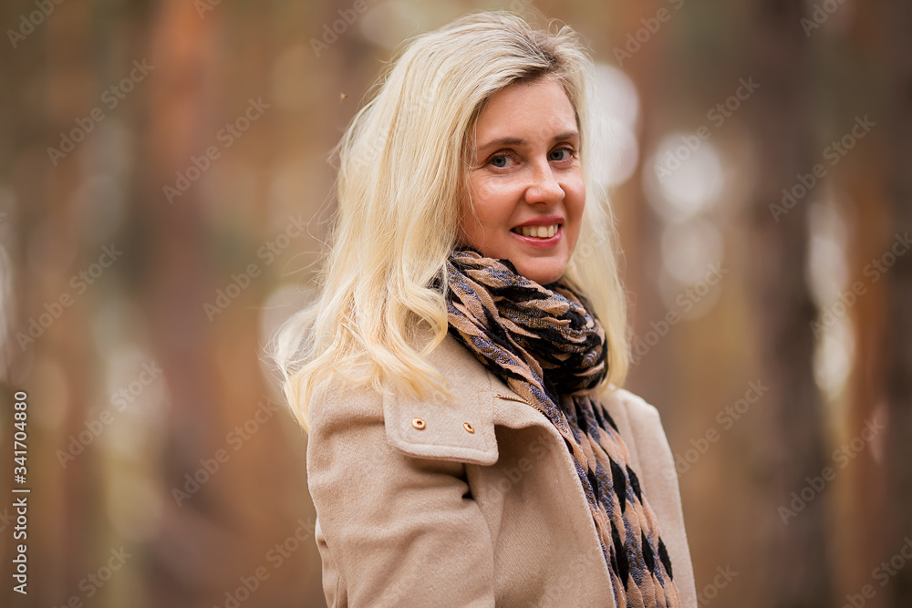 Outdoors portrait of beautiful women 40 years old laughing Outdoors portrait of beautiful women 40 years old laughing