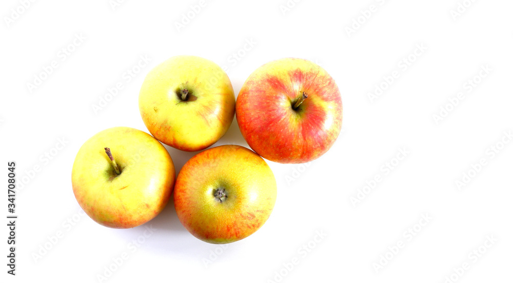 Juicy garden apples on a white background. Healthy fruits. Juicy garden apples on a white background. Healthy fruits.