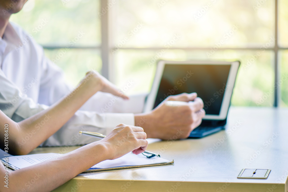 Hand of business woman or secretary take note on paperwork or sign contact while business meeting at office, business financial presentation conference concept Hand of business woman or secretary take note on paperwork or sign contact while business meeting at office, business financial presentation conference concept