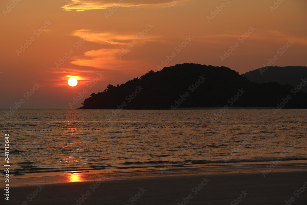 sunset at the beach in langkawi in malaysia