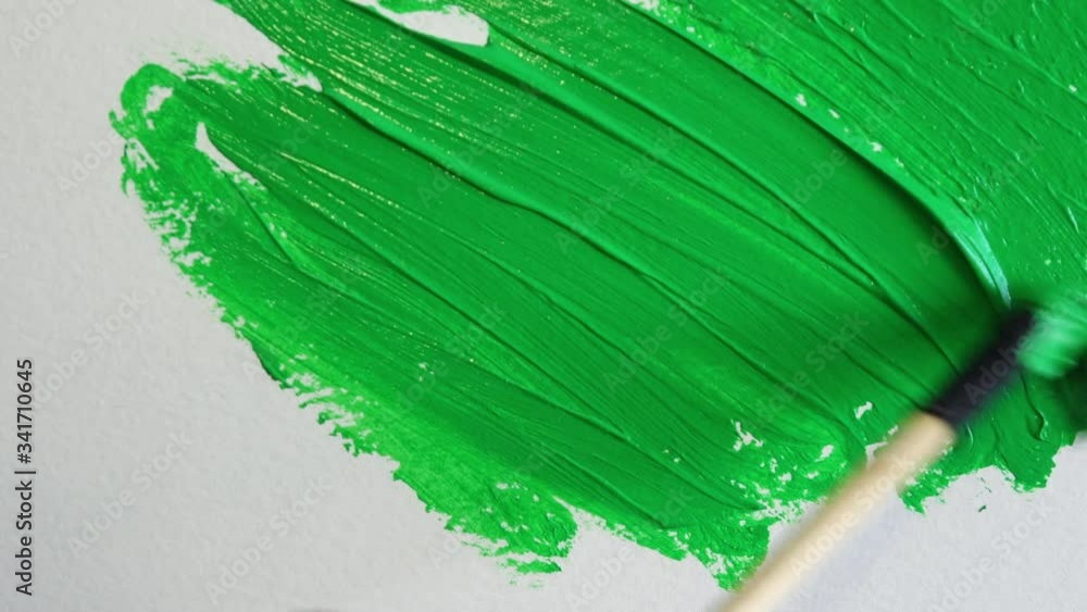 Chroma Key Paint Brushing Paper Time Lapse, Green Screen. Hand with a