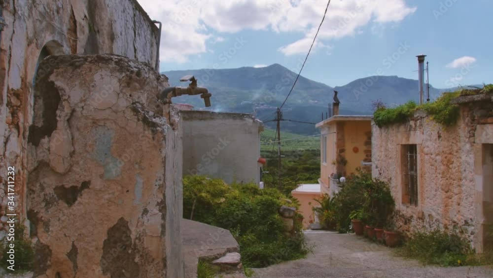 a water tap and a beautiful mountain scenery