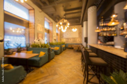 Blurred empty restaurant interior, quarantine concept, take away © Prostock-studio