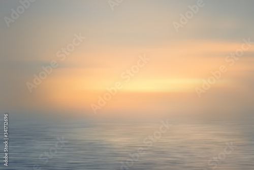 Dawn at the sea. Long exposure. Abstract blur background.