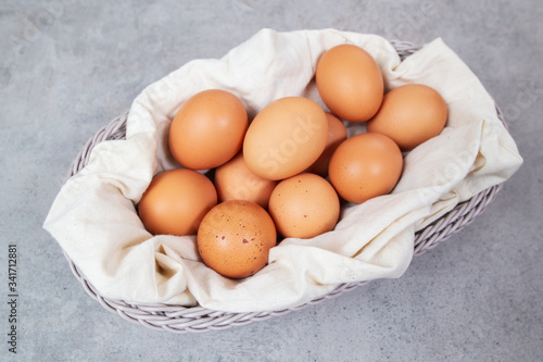 Chicken eggs in basket