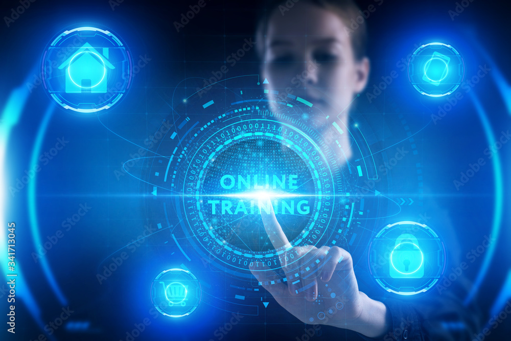 Business, Technology, Internet and network concept. Young businessman working on a virtual screen of the future and sees the inscription: Online training Business, Technology, Internet and network concept. Young businessman working on a virtual screen of the future and sees the inscription: Online training