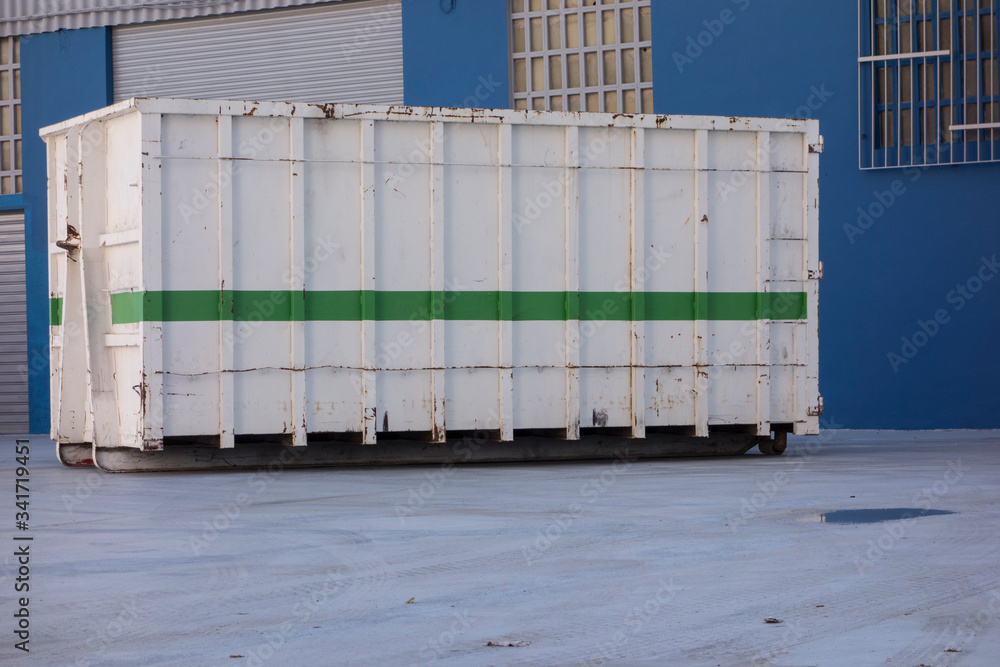 ship container at the gate of a factory