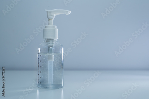Coronavirus prevention , Bottle of hand sanitizer alcohol gel - Grey background 1